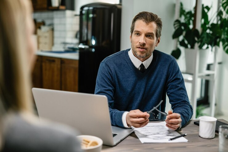 Insurance Agent Talking with a Client